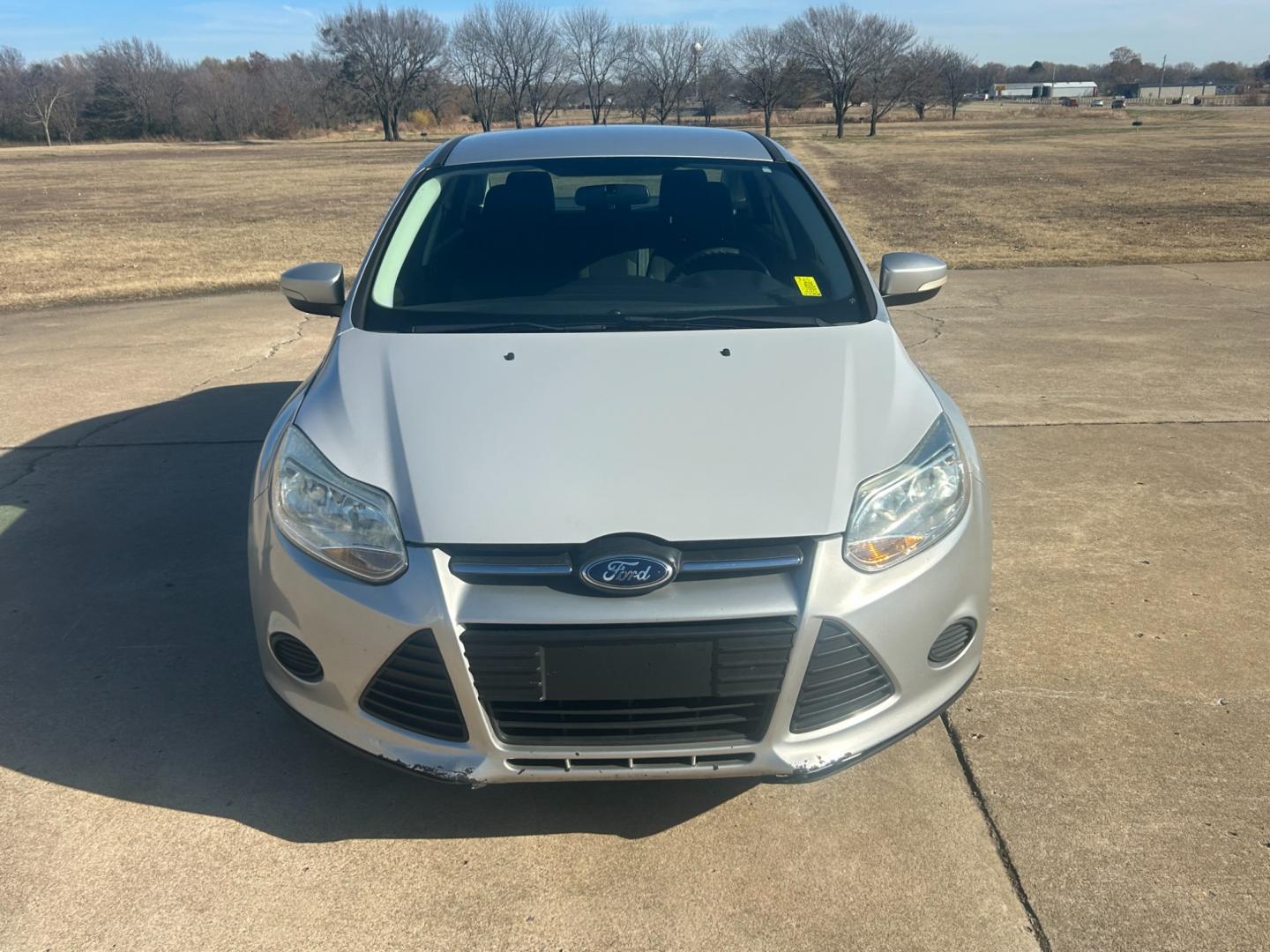 2013 Silver /Gray Ford Focus SEL FWD (1FADP3F2XDL) with an 2.4L engine, AUTOMATIC transmission, located at 17760 Hwy 62, Morris, OK, 74445, (918) 733-4887, 35.609104, -95.877060 - Photo#1